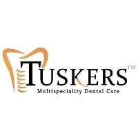 Tuskers Multispeciality Dental Care Logo