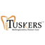 Tuskers Multispeciality Dental Care Logo