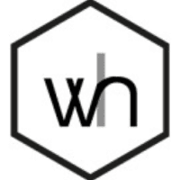 Whispering Homes Logo