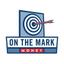 On The Mark Money, Inc. Logo