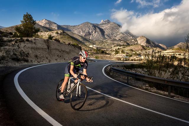 advertising-photography-cyclist-riding-mountains.jpg